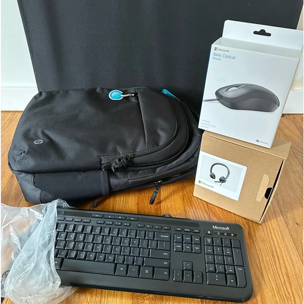 HP work station set. Complete with travel backpack, headset, mouse and keyboard